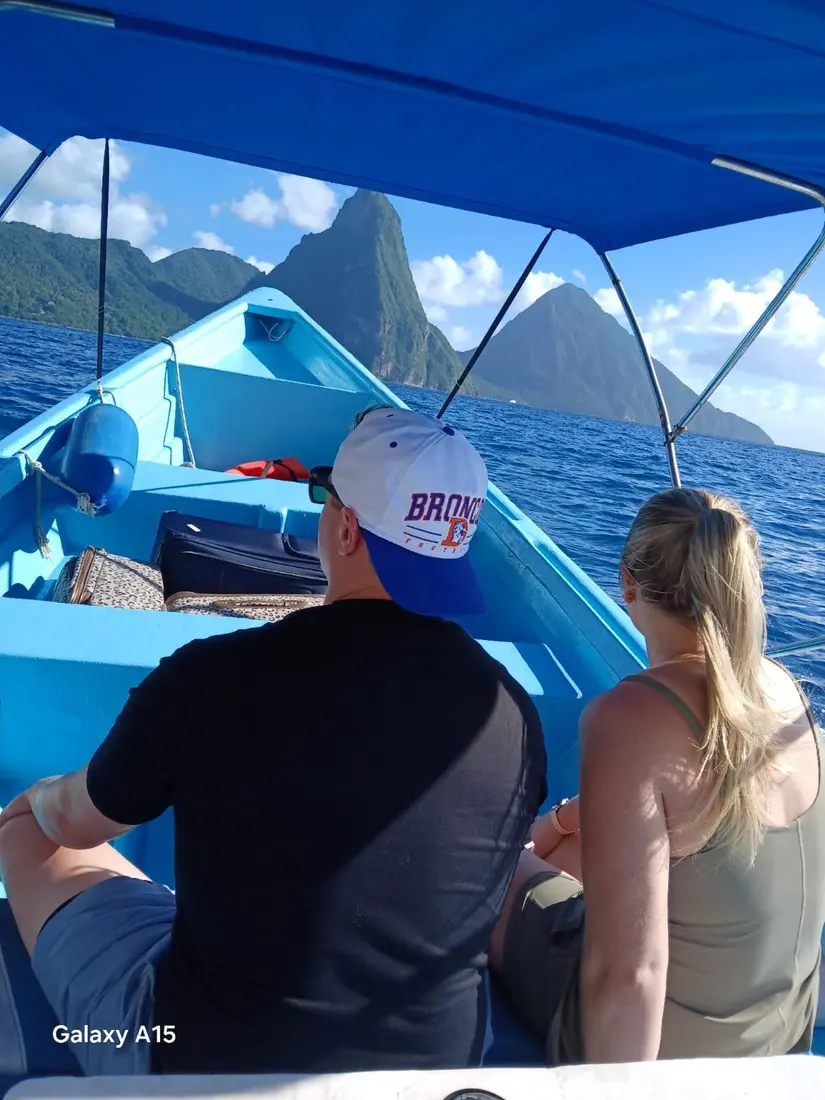 Guests enjoying the views from a St. Lucia tour boat